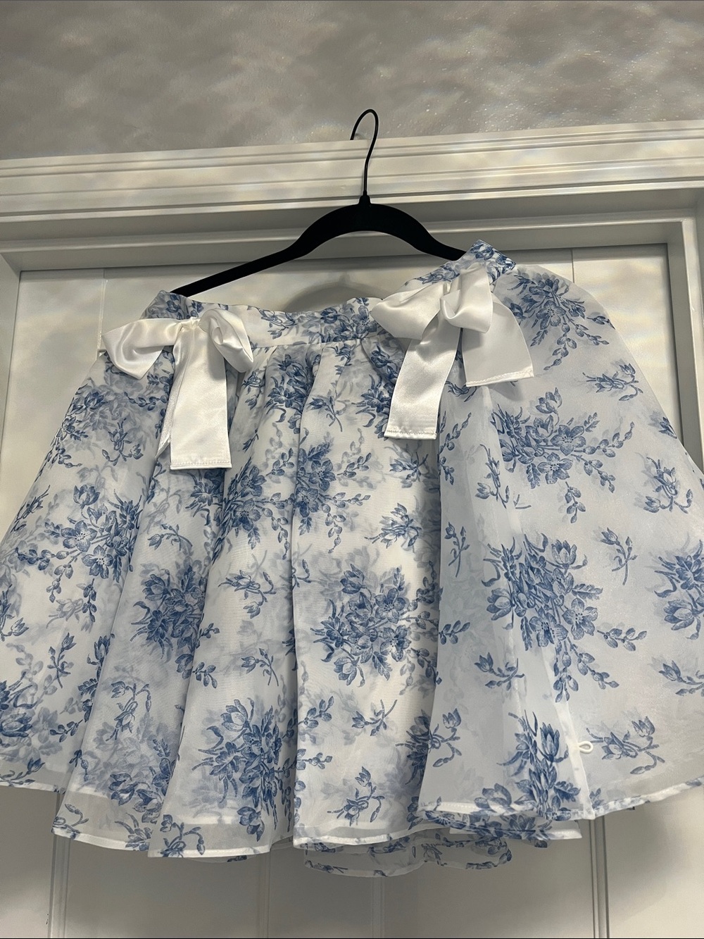 Selkie White and Blue Floral Mini Skirt with Ribbon Bows “Bed & Breakfast”